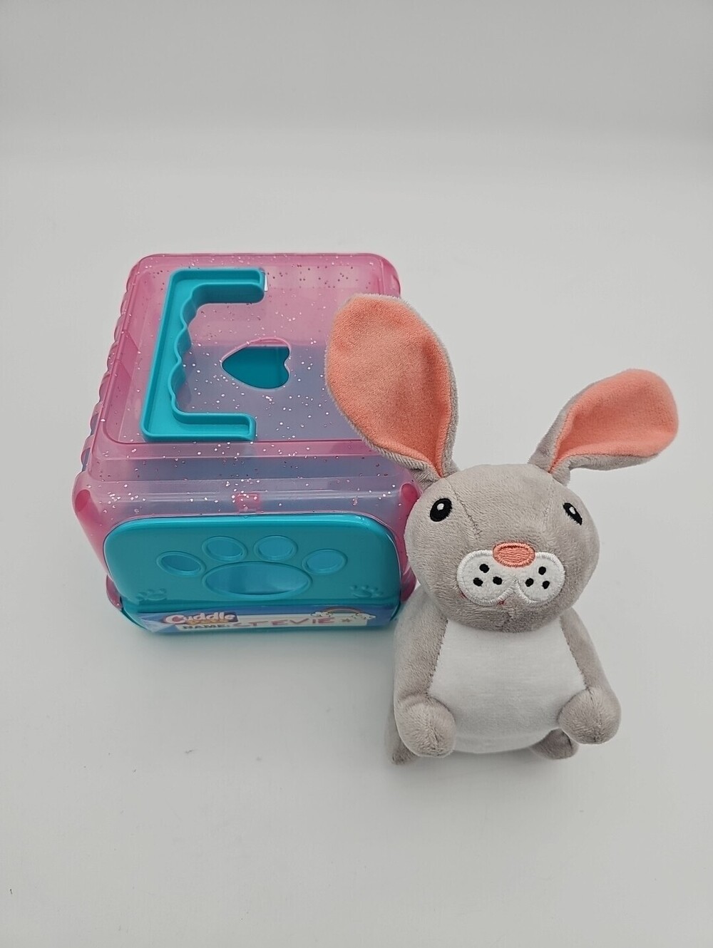 Gently used Cuddle Pets. Includes plush rabbit Or  cat, and carrier.  Nice